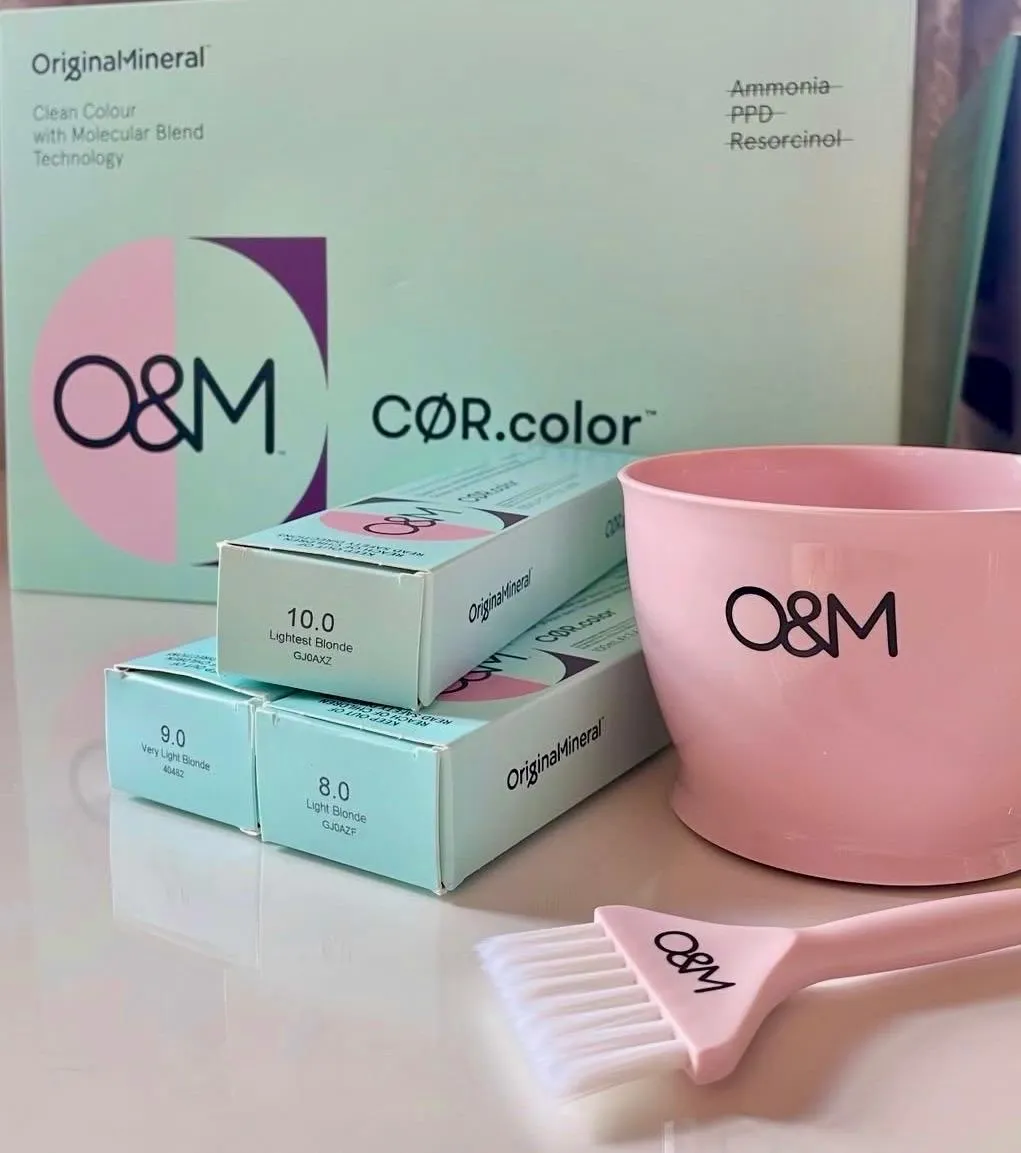 O&M COR.color clean colour box, individual blonde shade boxes and a pink O&M mixing bowl and brush.